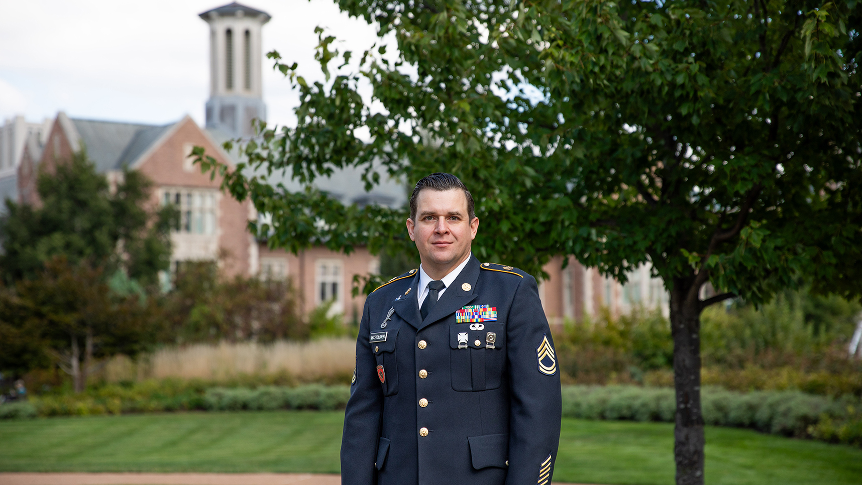 Student in military uniform on campus